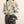 Black shoulder bag with gold-colored buckle – compact and chic