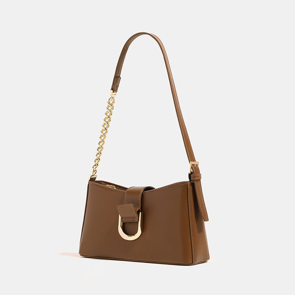 Brown shoulder bag with gold-colored chain and buckle detail