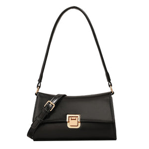 Black shoulder bag with gold-colored buckle – compact and chic