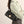 Black shoulder bag with gold-colored buckle – compact and chic